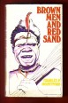 Brown Men and red Sand
